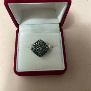 925 sterling silver with blue diamonds